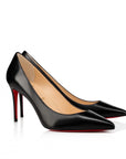 Elegant Black Leather Pumps with Iconic Sole