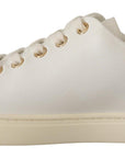 Studded Heart Leather Sneakers - Pure Elegance