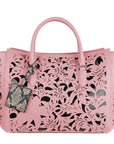 Chic Pink Calfskin Handbag with Floral Accents